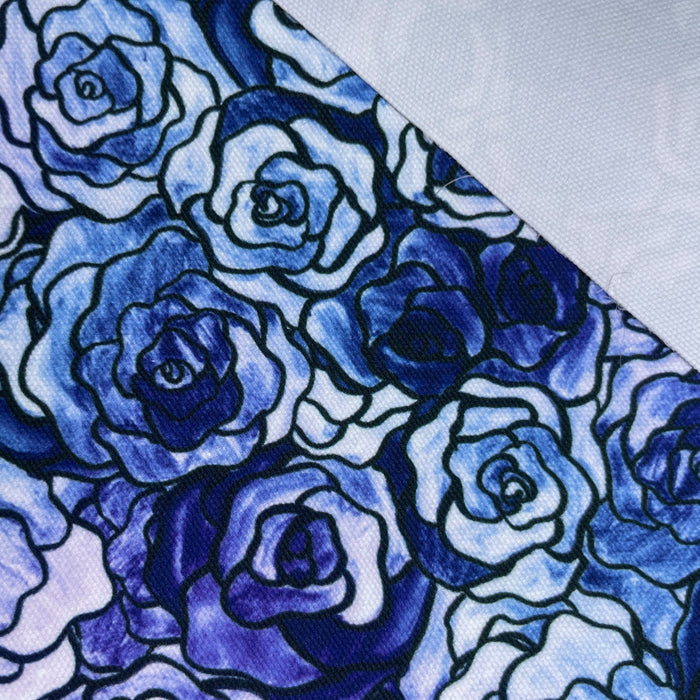 This printed WPCotton has roses that vary in shades of blue.