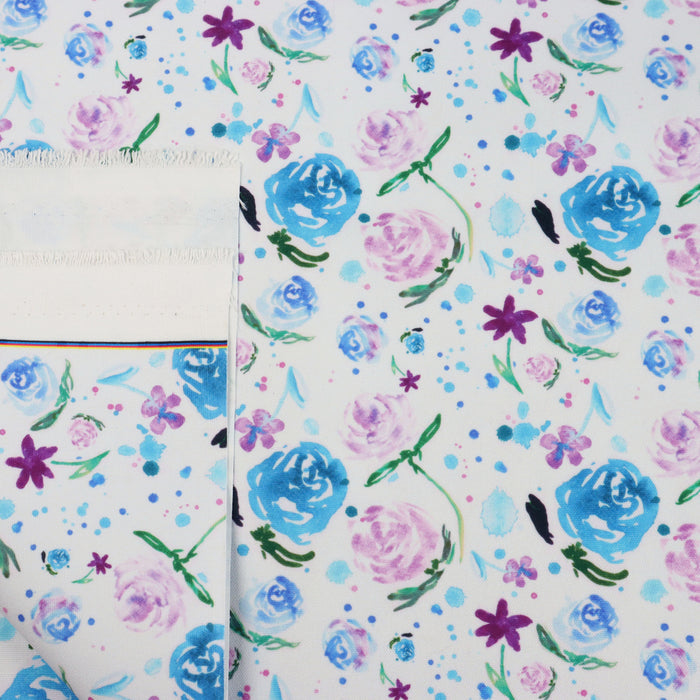 This printed WPCotton has roses and flowers in bright shades of blue, pink, and green.