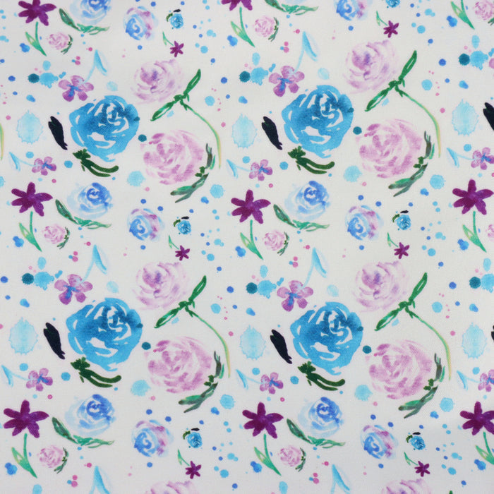 This printed WPCotton has roses and flowers in bright shades of blue, pink, and green.
