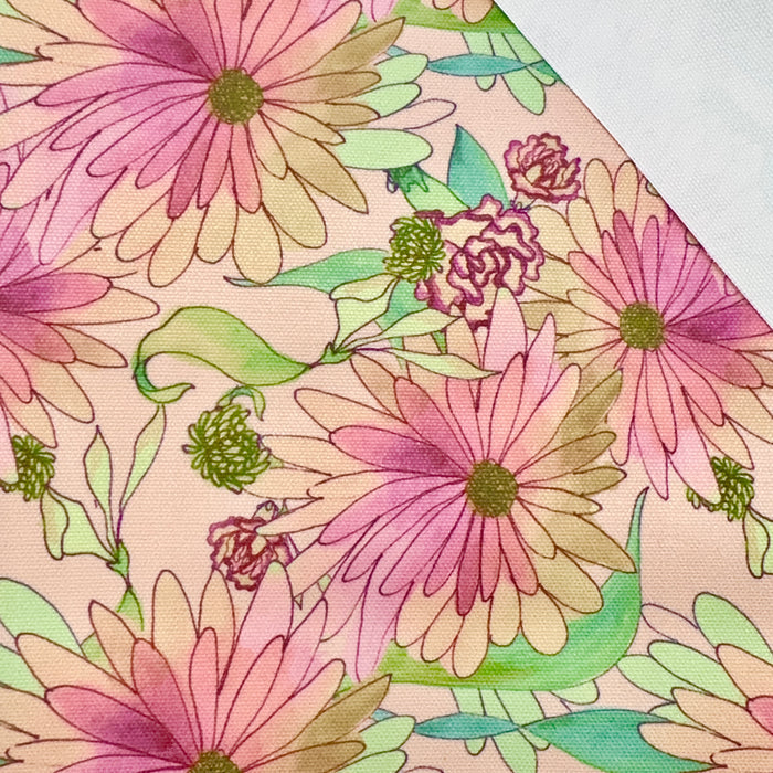This printed WPCotton features daisy flowers in shades of pink, orange, and green.