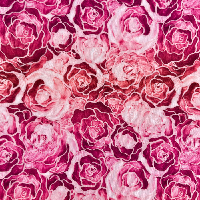 This printed WPCotton has roses that vary in shades of pink.