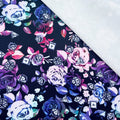 This printed WPCotton features a design with roses in a blue to pink to green ombre and different types of dice on top.