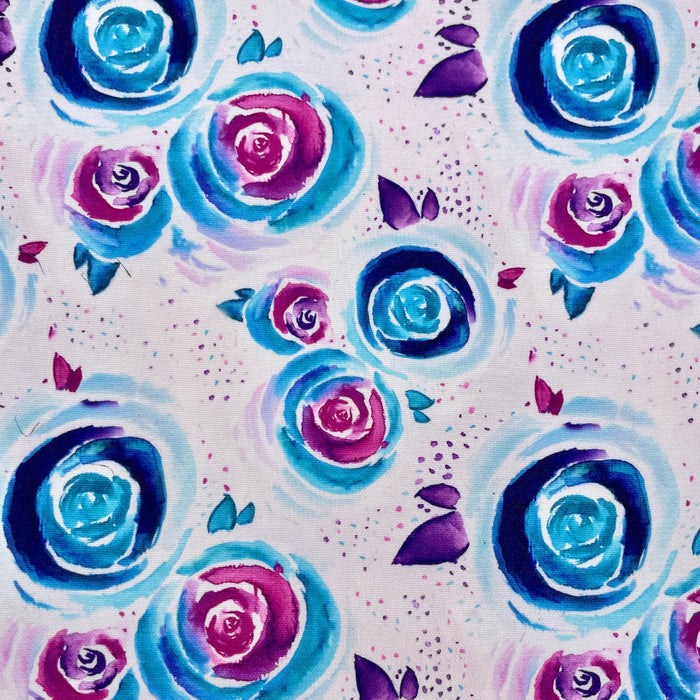This printed WPCotton features watercolor roses in shades of blue and pink on a pale background.