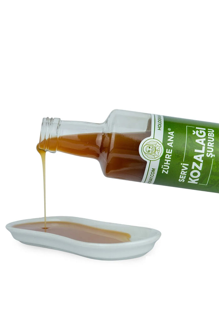 Zuhre Ana Pine Cone Syrup with Cypress Cone and Elderberry is a traditional herbal blend crafted with carefully selected plant extracts.